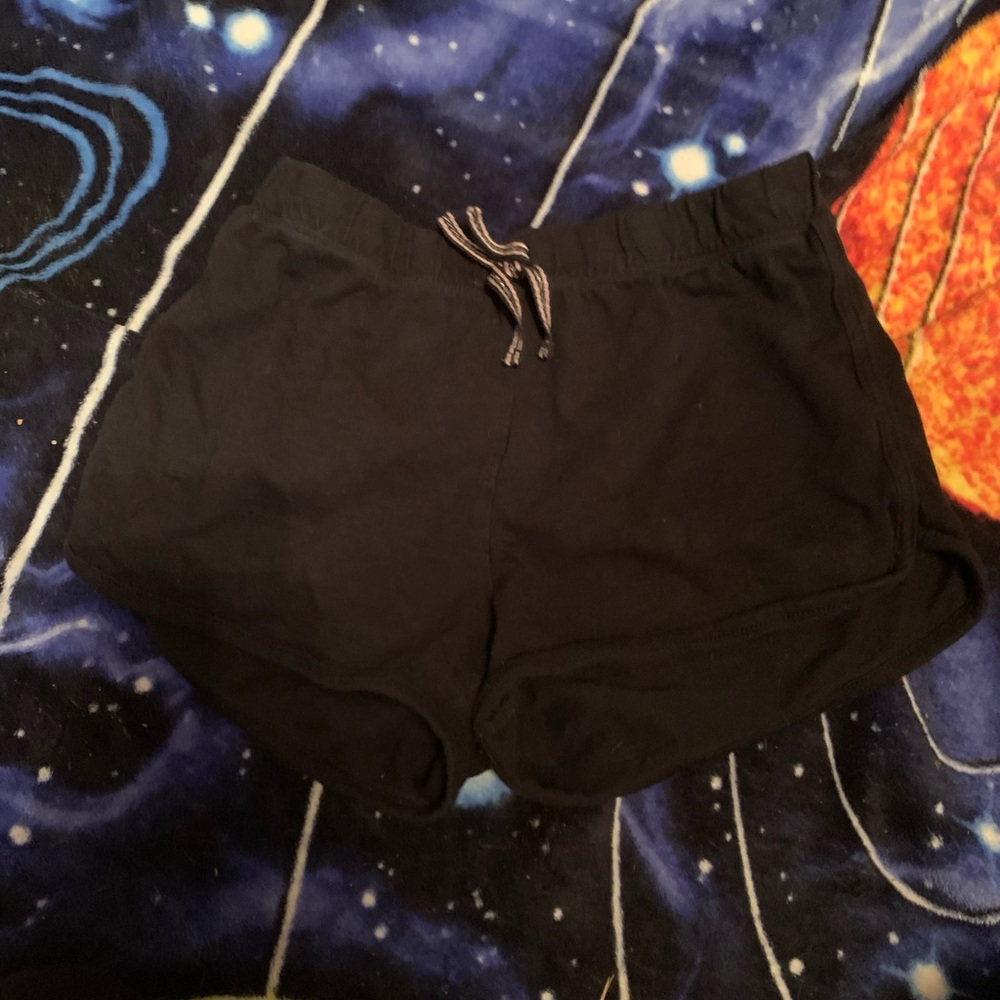 black shorts with pink and silver stripped tie. size small